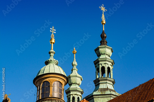 Prague, Czech republic - September 19, 2020. Golden details of the tops of Brevnov Monastery photo