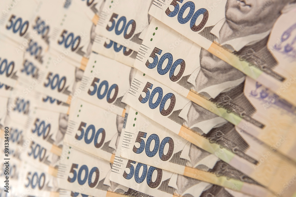 pile of 500 banknotes ukrainian money as financial background. Money and save concept pile of 500 banknotes ukrainian money as financial background. Money and save concept