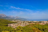 View of Kemer town on a coast of the Mediterranean sea in Antalya province, Turkey. Turkish Riviera. View from a mountain