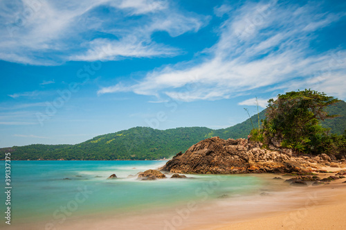 View of the sea with Praia do Meio and its crystal clear waters. Trindade, Paraty, RJ.