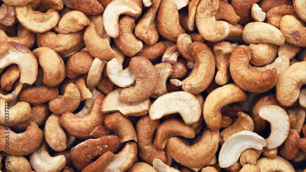 Rotating cashew nuts peeled full. View from above. Rotating cashew nuts peeled full. View from above.