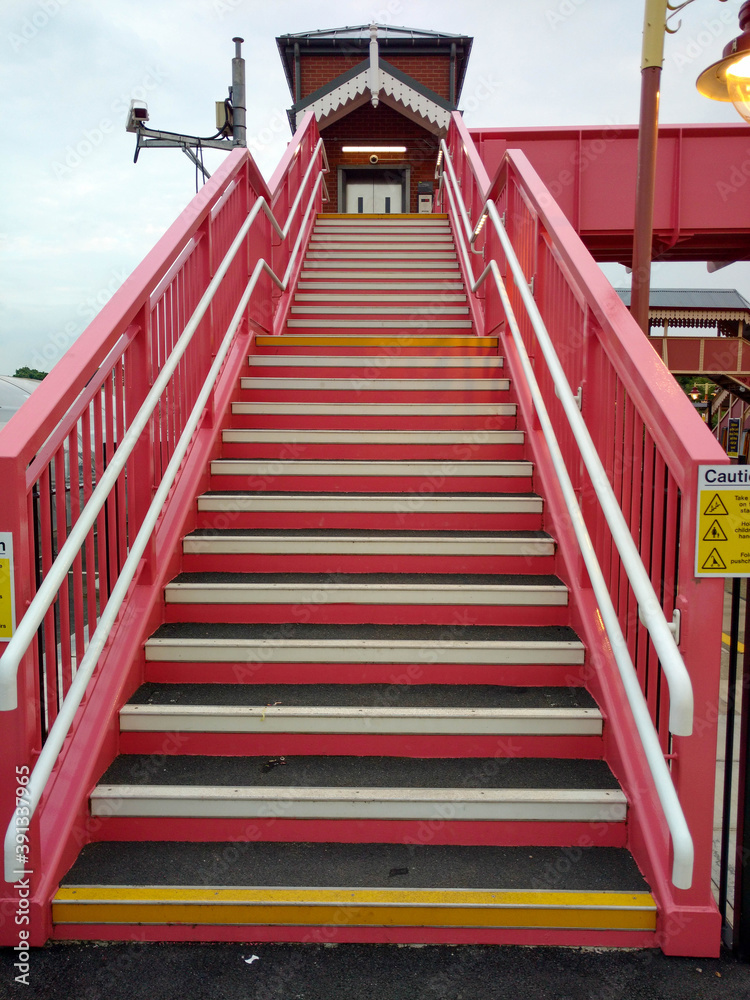 Red starirs going p to railway bridge crossing, Stratford Upon Avon Red starirs going p to railway bridge crossing, Stratford Upon Avon