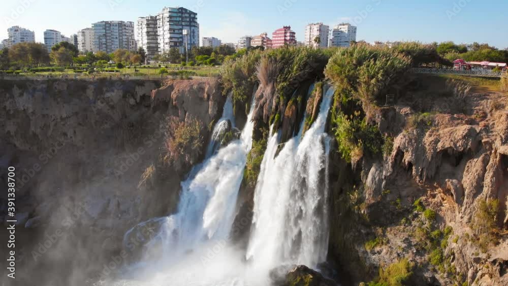 Fly over a high, powerful waterfall that falls into the Mediterranean Sea in eastern Turkey. High indicators of clean ecology. 4K Fly over a high, powerful waterfall that falls into the Mediterranean Sea in eastern Turkey. High indicators of clean ecology. 4K
