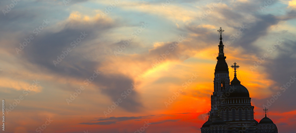  image of a Christian temple on a sunset background