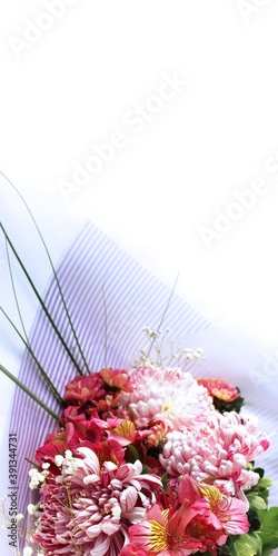 Festive flower arrangement in bright colors.Roses, chrysanthemums and ectromelia the elegant bouquet. Background for greetings, invitations, wedding and birthday cards photo