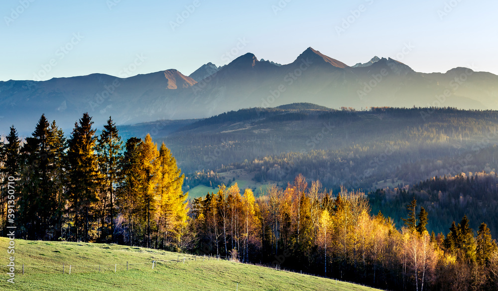 Beautiful unusual mountain landscape. Autumn sunset with a view of the Tatra Mountains. Beautiful Polish views.
