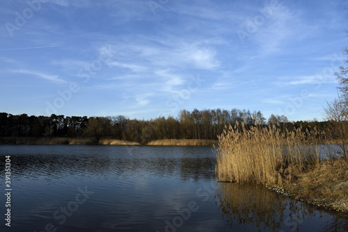 Autumn lake with blue sky