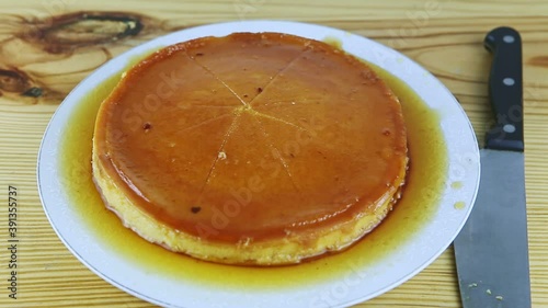 Wallpaper Mural top view panorama at sliced round homemade flan with caramel syrup Torontodigital.ca