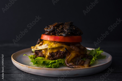 Bunless burger gluten free beef onions mushroms dark food egg tomato photo