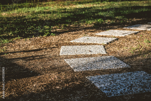 Stone pathway to the garden in tuscany italy