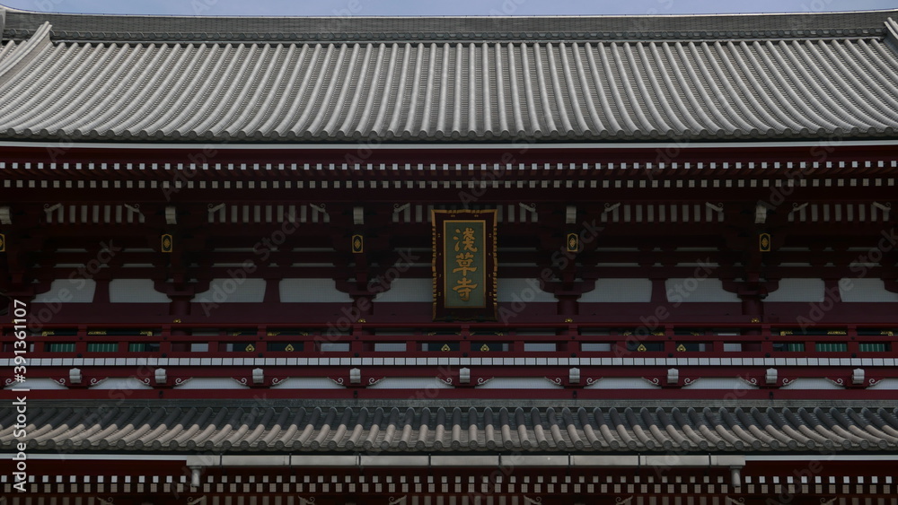 Roof of a beautiful ancient buddhist temple in japan predominating de color red Roof of a beautiful ancient buddhist temple in japan predominating de color red