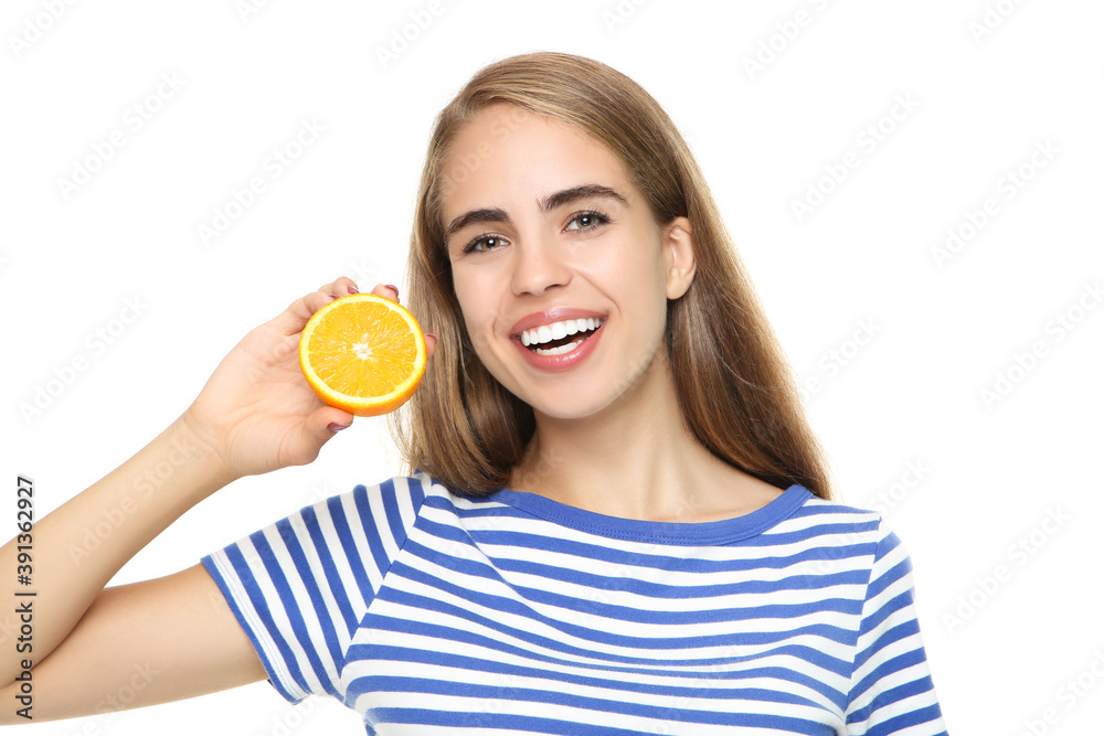 Young girl holding fresh orange fruit on white background Young girl holding fresh orange fruit on white background