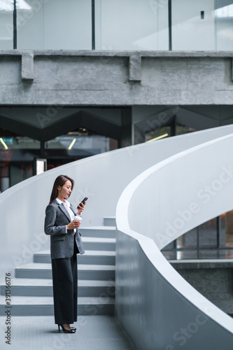 Businesswoman On Office Staircase