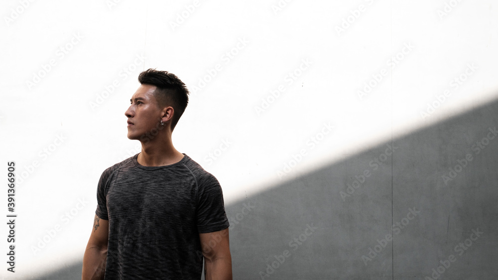 © JIACHUAN LIU/Stocksy - A Chinese man is exercising in the city