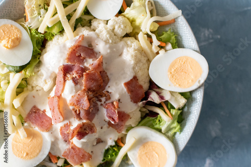 Obraz na plátně delicious boiled egg and bacon salad low carb meal idea