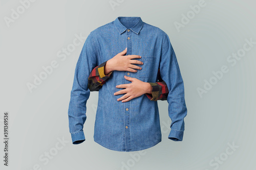 Hands hug a shirt