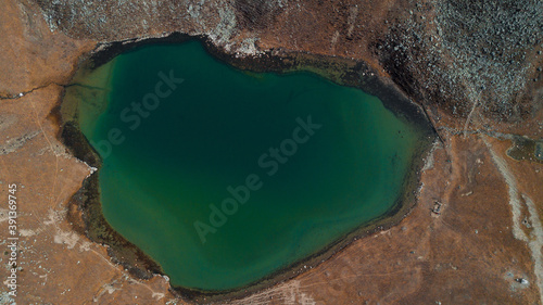 Ice lake on the trek around Annapurna mountain, Nepal photo