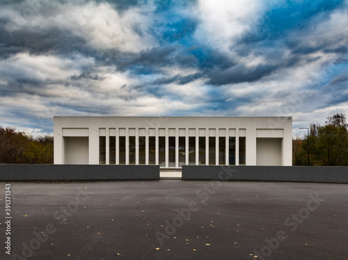Modern сrematorium building under the blue sky