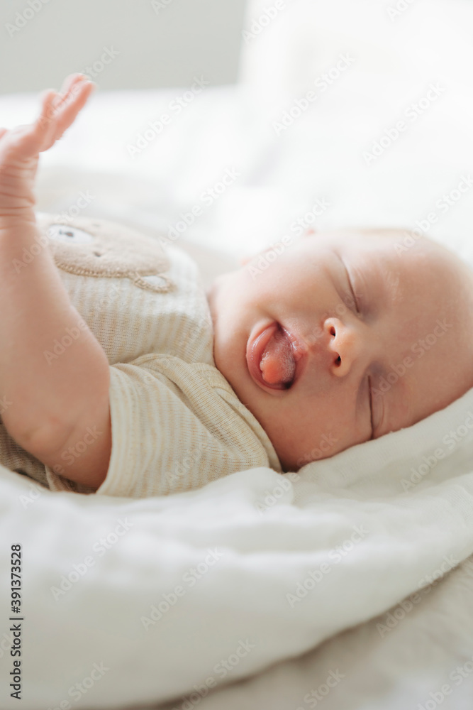 Sleeping baby lying on bed Sleeping baby lying on bed