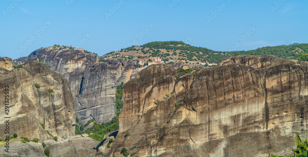 Panoramic view of spectacular rock formations and monasteries (Great Meteoron, Varlaam and Rousanou) Meteora, Greece