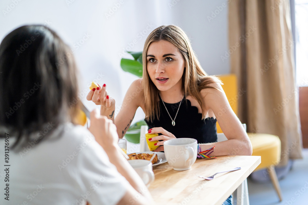 Couple Of Young Girls Having Breakfast. Couple Of Young Girls Having Breakfast.