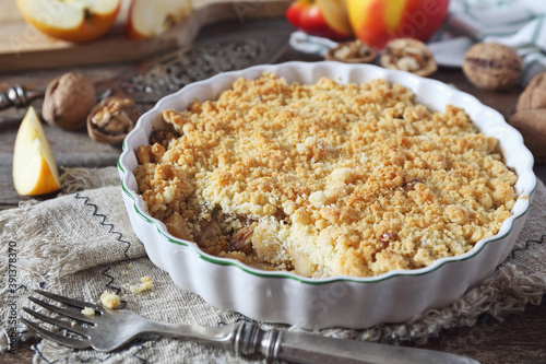 Apple crumble with walnuts and cinnamon