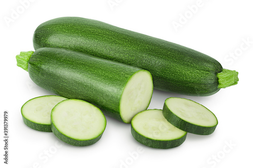 Fresh whole and sliced zucchini isolated on white background with clipping path and full depth of field photo