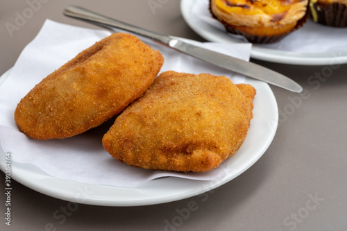 Street food in Portugal, savory pastries with meat or fish served for lunch