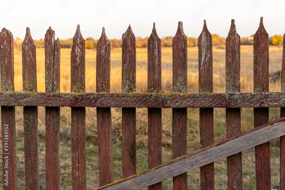 old wooden fence in countryside village closeup old wooden fence in countryside village closeup