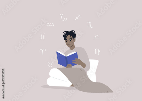 Astrology concept, a young male Black character reading a book about zodiac signs