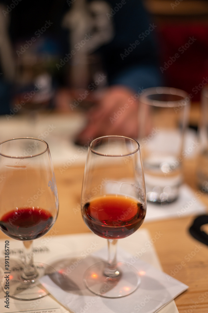 Professional tasting of different fortified dessert ruby, tawny port wines in glasses in porto cellars in Vila Nova de Gaia, Portugal Professional tasting of different fortified dessert ruby, tawny port wines in glasses in porto cellars in Vila Nova de Gaia, Portugal