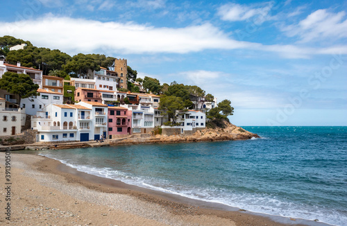 The seaside path and the beach of Sa Tuna in the village of Begur on t photo