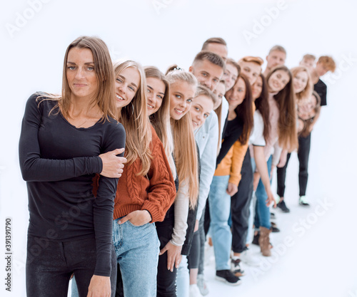 group of happy young people standing in line