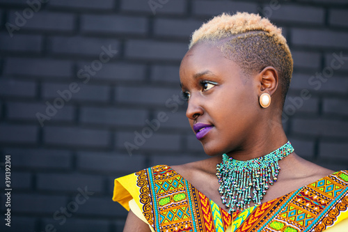 Portrait of confident black woman wearing African clothes photo