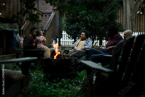 Black friends safely gathered at backyard kickback party