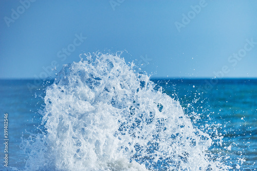 Wave of the sea water at sunny day time.