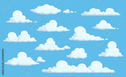 Cartoon clouds in blue sky. Vector white soft and fluffy spindrift or cumulus clouds flying on heaven background, weather and nature isolated design elements. Meteorology and climate themed icons set