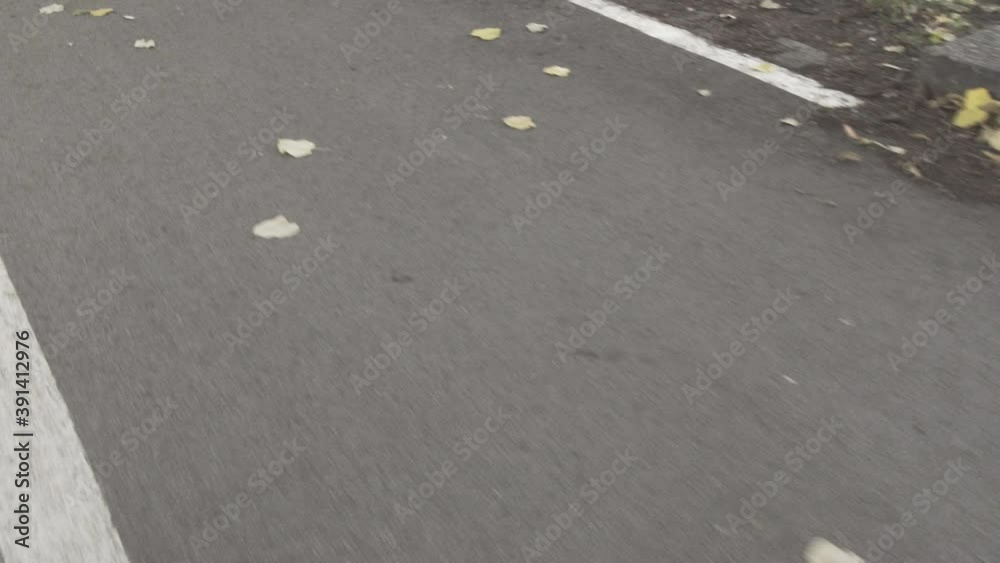riding bike on a bicycle lane. sign painted on asphalt road. riding bike on a bicycle lane. sign painted on asphalt road.