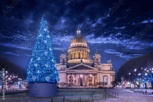 Saint Petersburg. Russia. Christmas tree on St. Isaac's square. Festive evening in Petersburg. St. Isaac's Cathedral against a dark sky and Christmas decorations. Christmas decorations on the streets