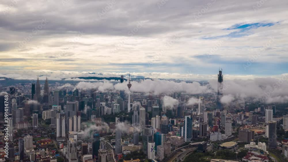 aerial hyperlapse of panorama of the kuala lumpur city during low cloud. aerial hyperlapse of panorama of the kuala lumpur city during low cloud.