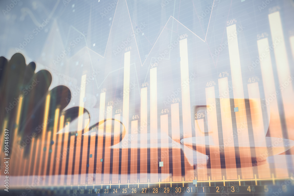 Double exposure of financial chart drawing and desktop with coffee and items on table background. Concept of forex market trading Double exposure of financial chart drawing and desktop with coffee and items on table background. Concept of forex market trading