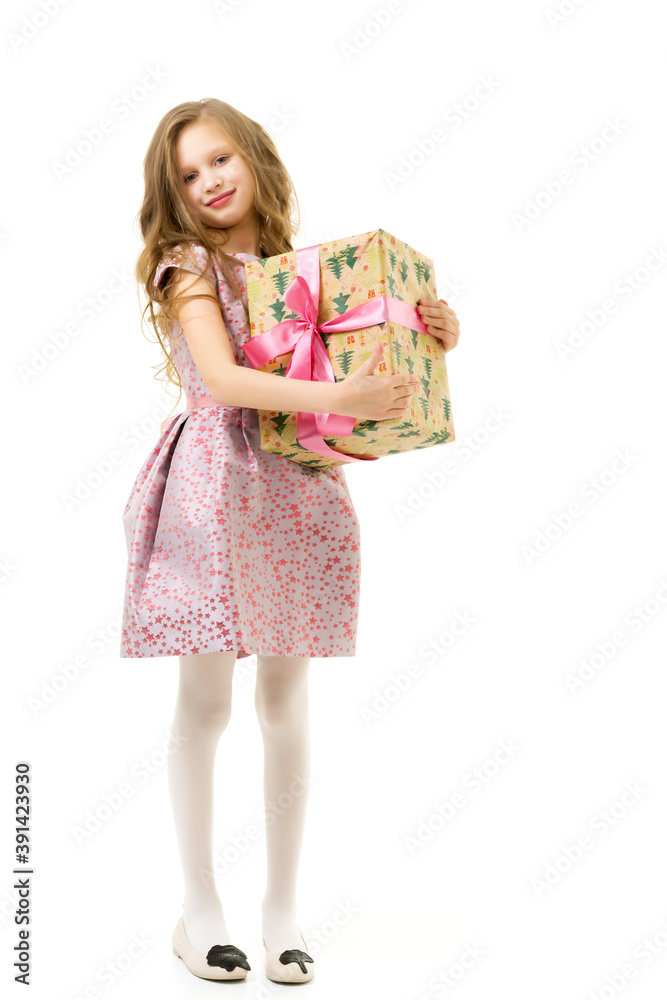 Cheerful Beautiful Blonde Girl in Pink Dress Holding Gift Box Cheerful Beautiful Blonde Girl in Pink Dress Holding Gift Box