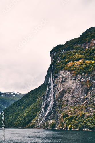 Vertical shot of  Seven Sisters Waterfall, Norway photo