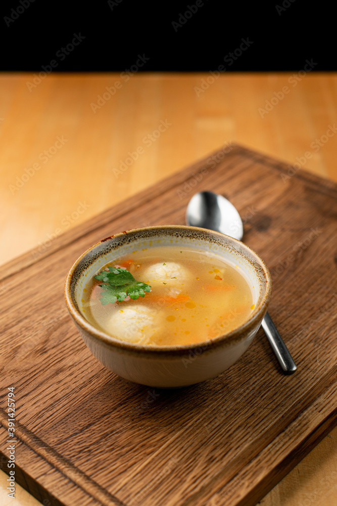 Hot autumn soup with meatballs, comfort food for healing illness Hot autumn soup with meatballs, comfort food for healing illness