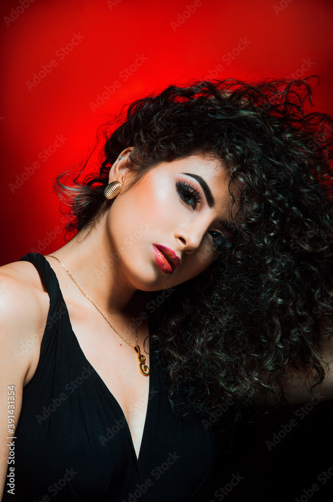 Fototapeta premium portrait of a woman with curly hair