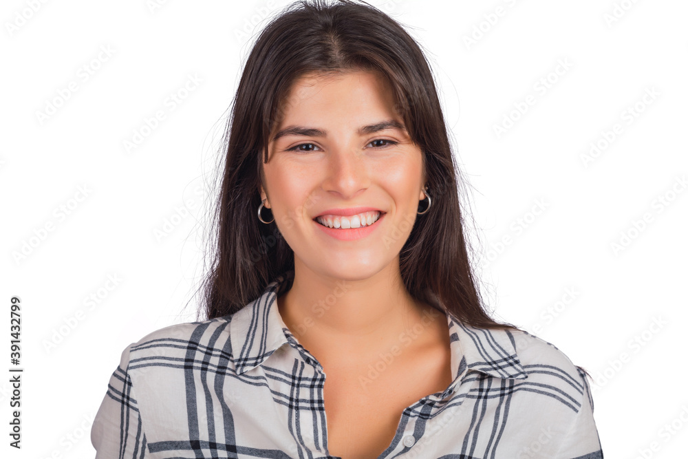 Young woman looking at camera and smiling. Young woman looking at camera and smiling.