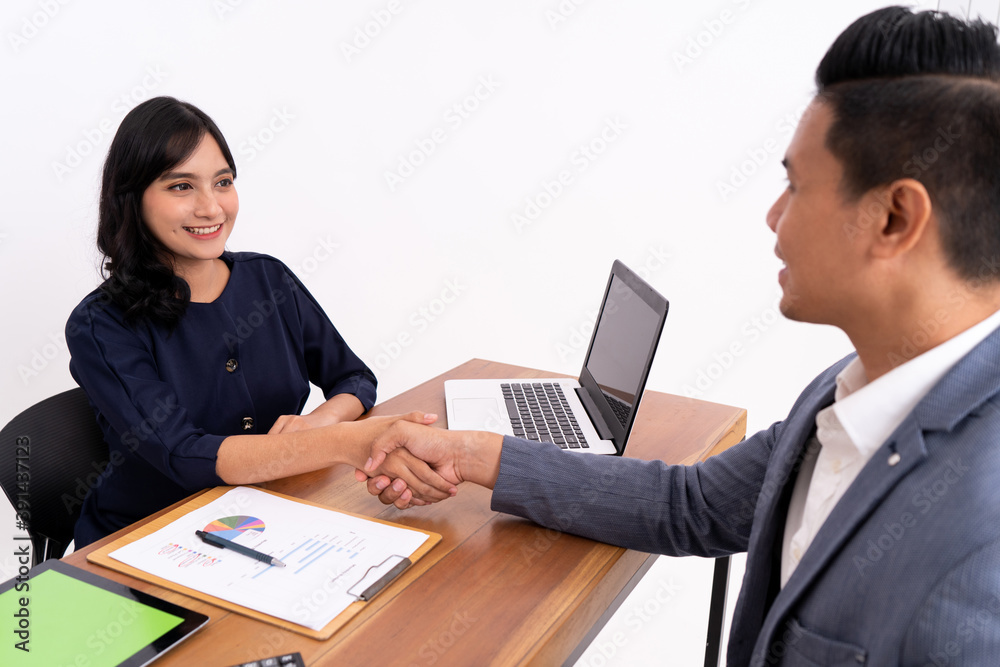 a business man transacts his credit agreement to a customer service woman. in the office a business man transacts his credit agreement to a customer service woman. in the office