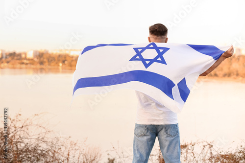 Man with the flag of Israel...