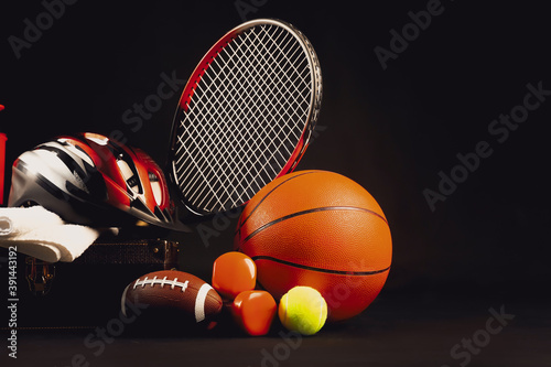 Set of sport equipment on dark background