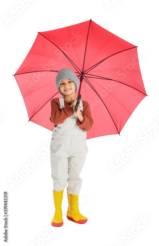 Cute African-American boy with umbrella on white background